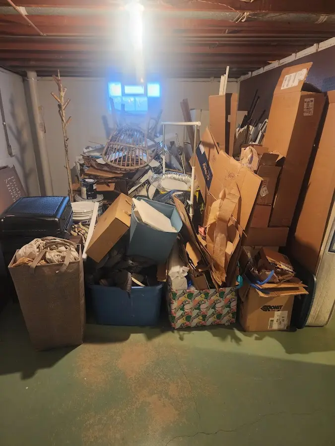 Roll-off dumpster container at job site for Cleanout Dumpster Rental in Smithville